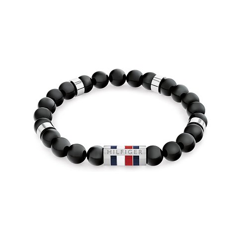 Tommy Hilfiger Armband aus Edelstahl mit matten schwarzen Onyx-Farbstein-Kügelchen und Hilfiger Logo in der Mitte.