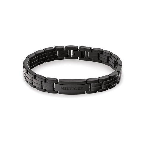 Tommy Hilfiger Armband aus schwarzem Edelstahl, mit breitem Verschluss und eingeprägtem Tommy Hilfiger Logo.