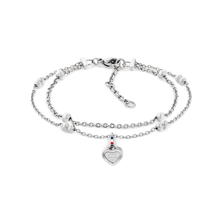 Tommy Hilfiger Armband aus Edelstahl mit filigranen Ketten, Perlen und einem gravierten Herzanhänger.