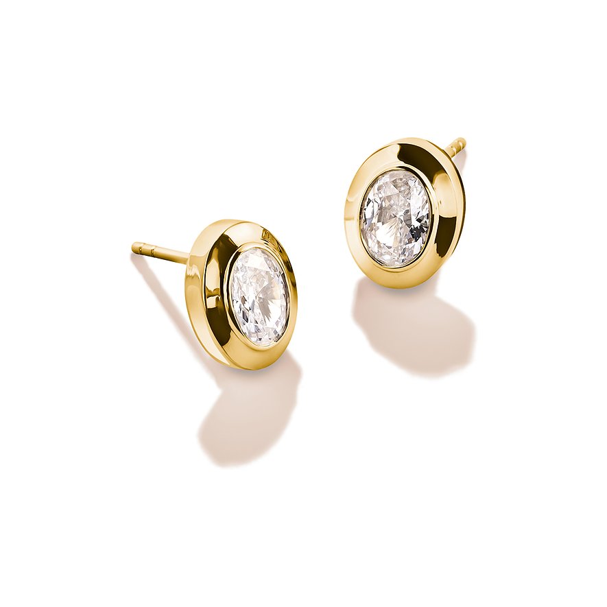 Ein Paar goldfarbene Thomas Sabo-Ohrstecker aus Silber mit ovalem Zirkonia, schräg von oben aufgenommen.