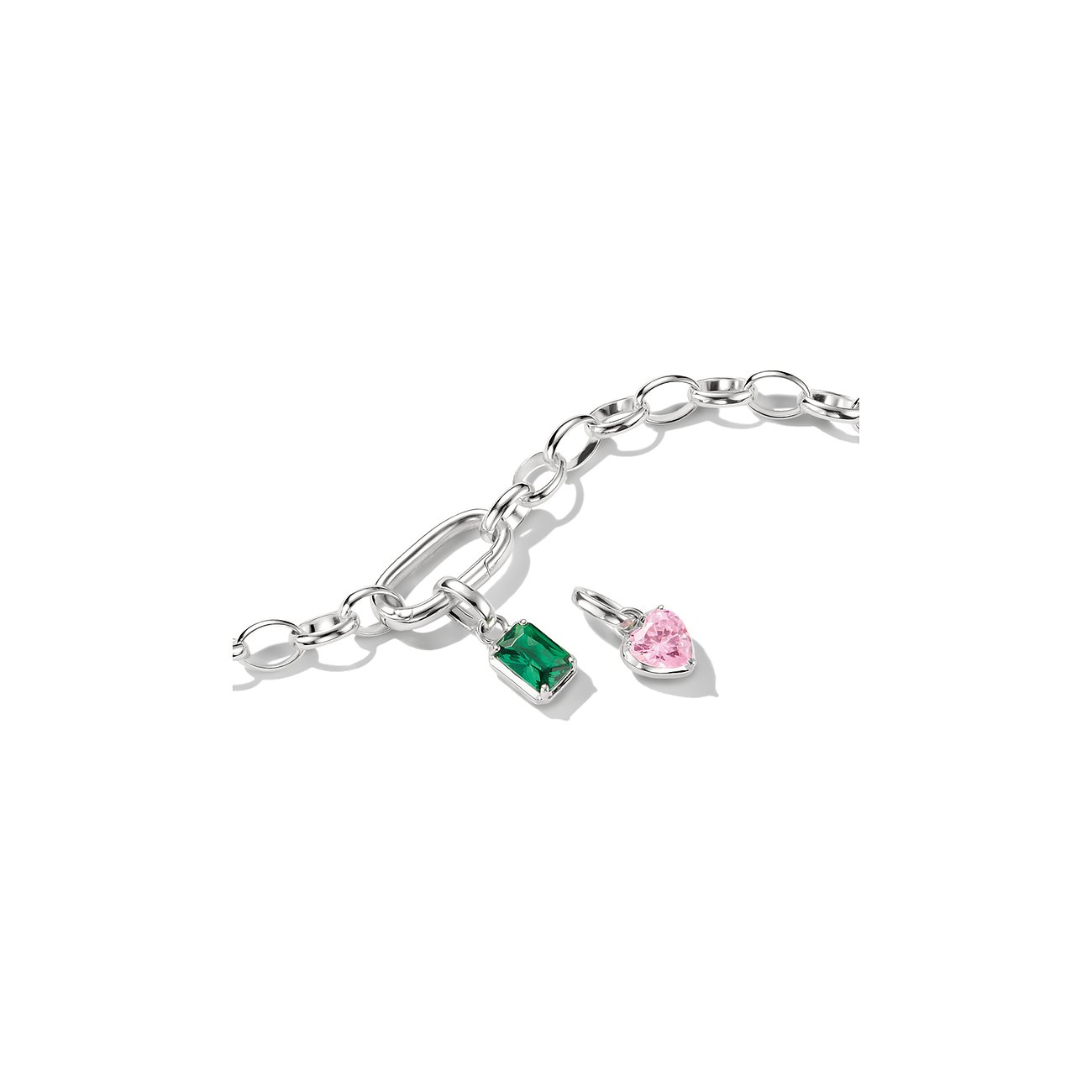 Charm pendente Thomas Sabo argento con zircone verde rettangolare e zircone rosa a forma di cuore.