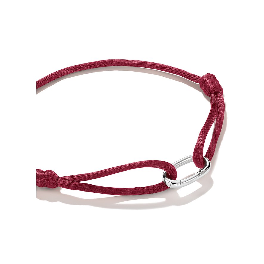Bracciale Thomas Sabo: cinturino in tessuto rosso con elemento metallico centrale ovale color argento.