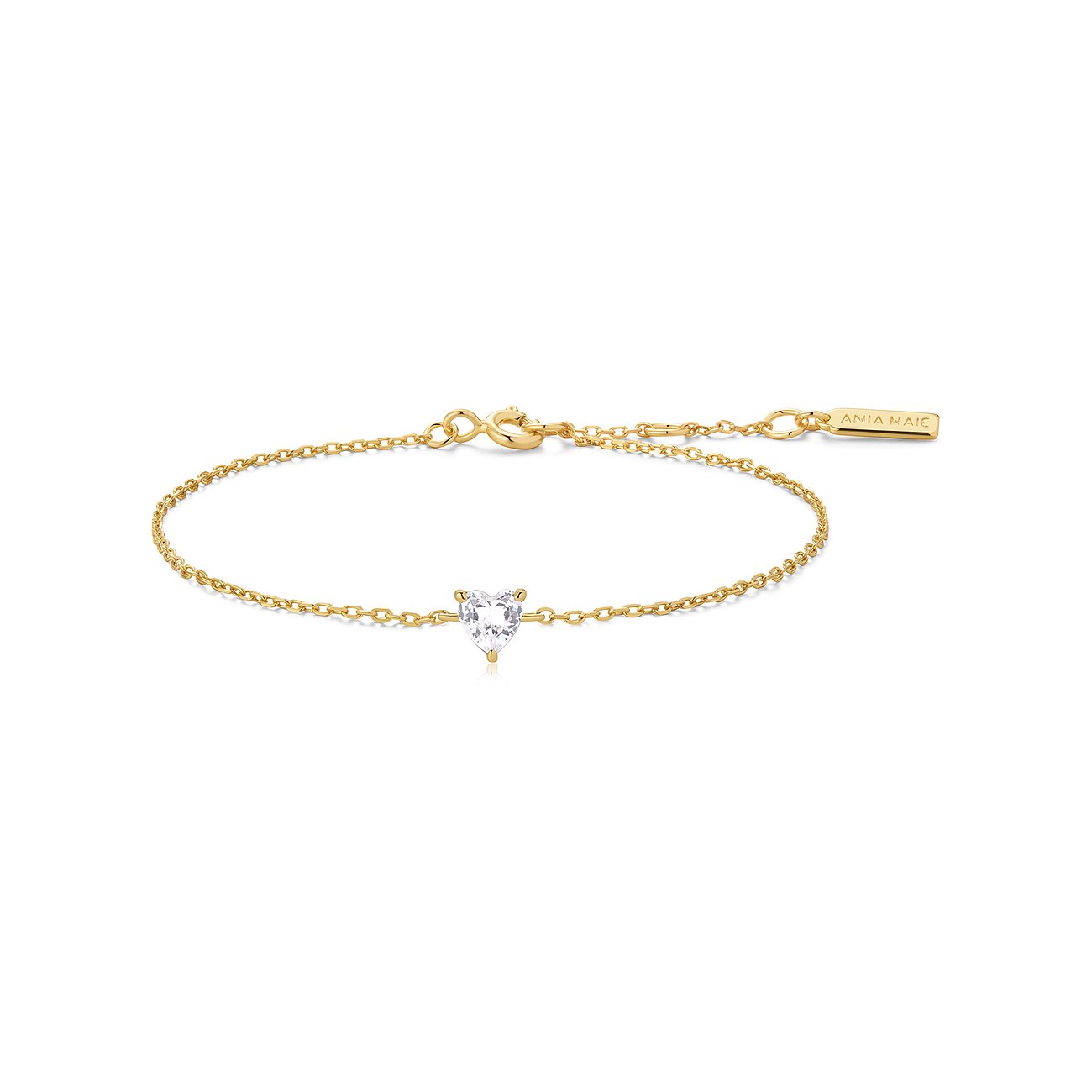 Ania Haie armband van verguld 925 sterling zilver met een hartvormige gekleurde zirkonia edelsteen in het midden.
