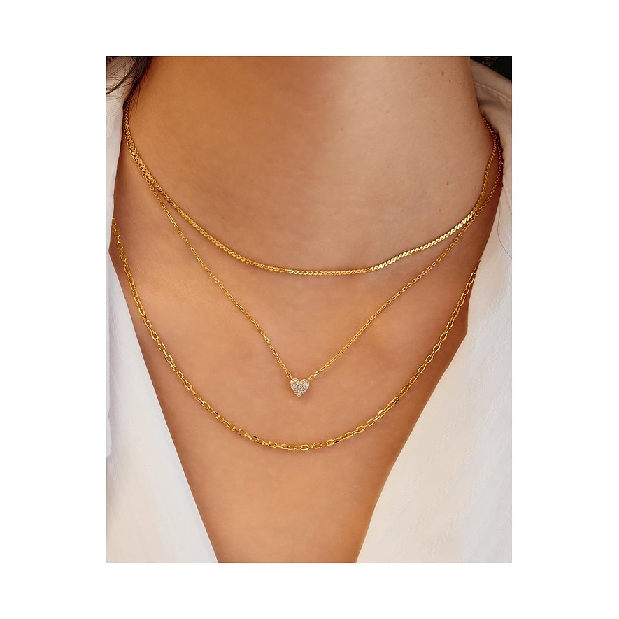 Ania Haie Halsketten aus vergoldetem 925er Silber. Die untere Kette zeigt ein Herz aus farbigen Zirkonia.