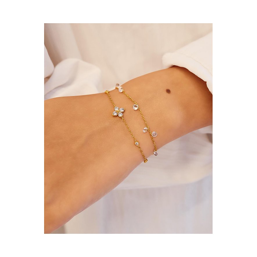 Ania Haie armband van verguld zilver met bloemvormige en rond geslepen zirkonia stenen.