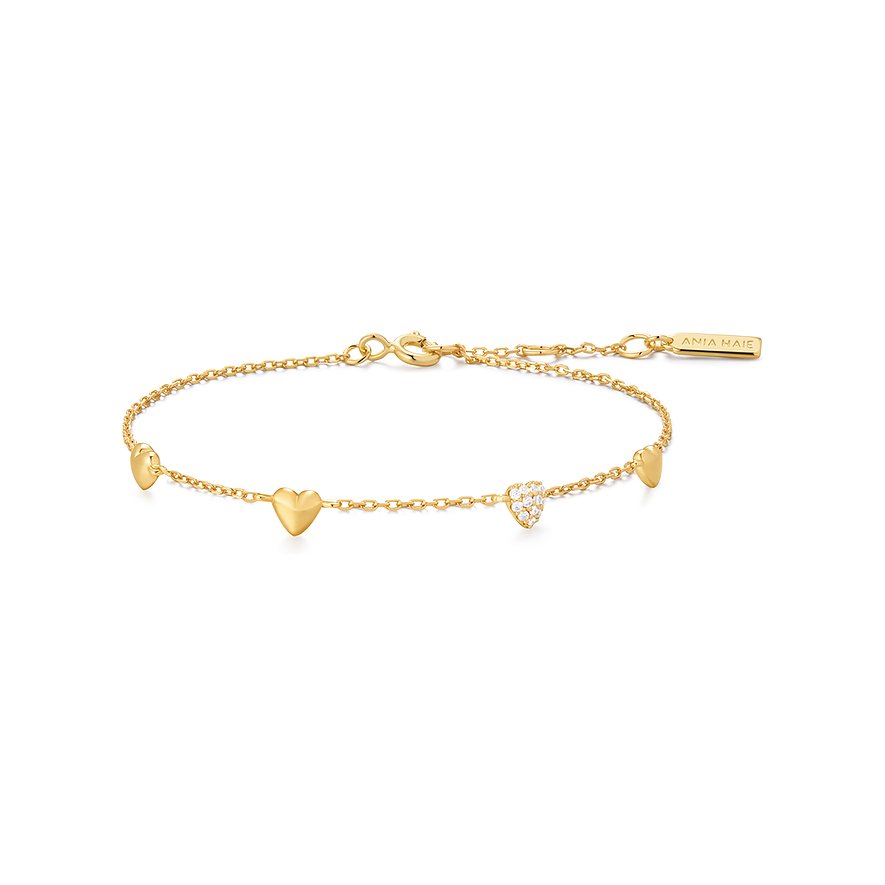 Bracciale Ania Haie in argento placcato oro con cinque ciondoli a cuore, uno con zirconi incolori.