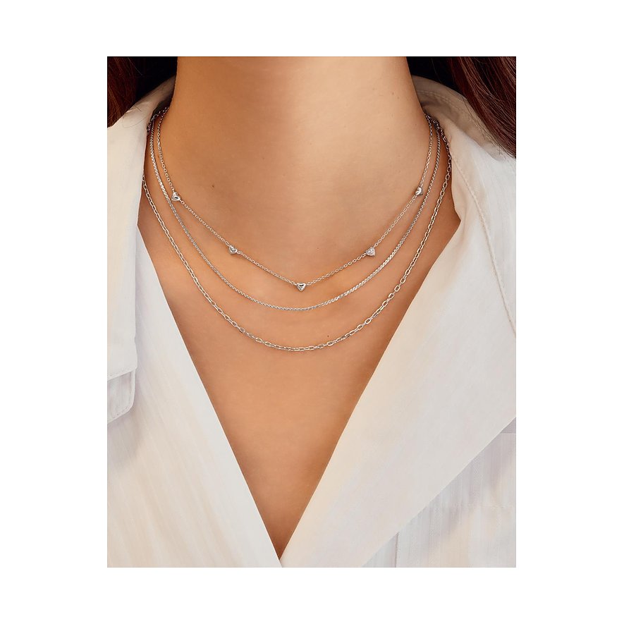 Ania Haie zilveren halsketting: drie filigraan kettingen met zirkonia, de bovenste met hart-zirkonia.