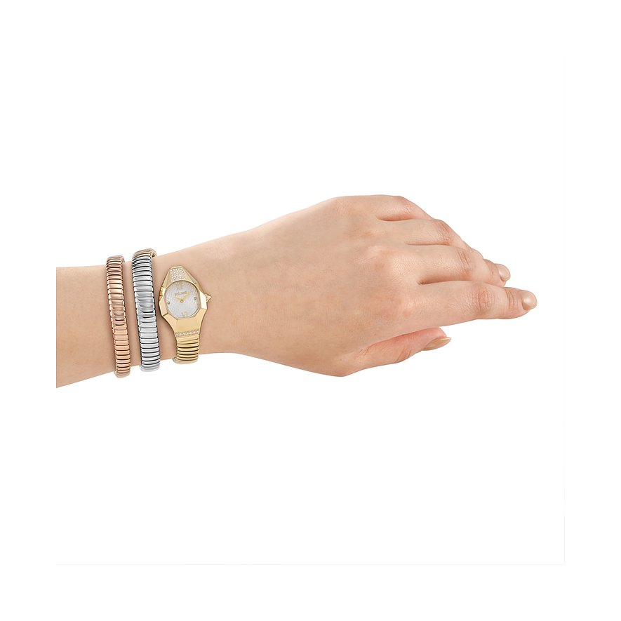 Et Just Cavalli dameur i rustfrit stål med farvede krystaller. Guldfarvet urkasse, matchende to armbånd.