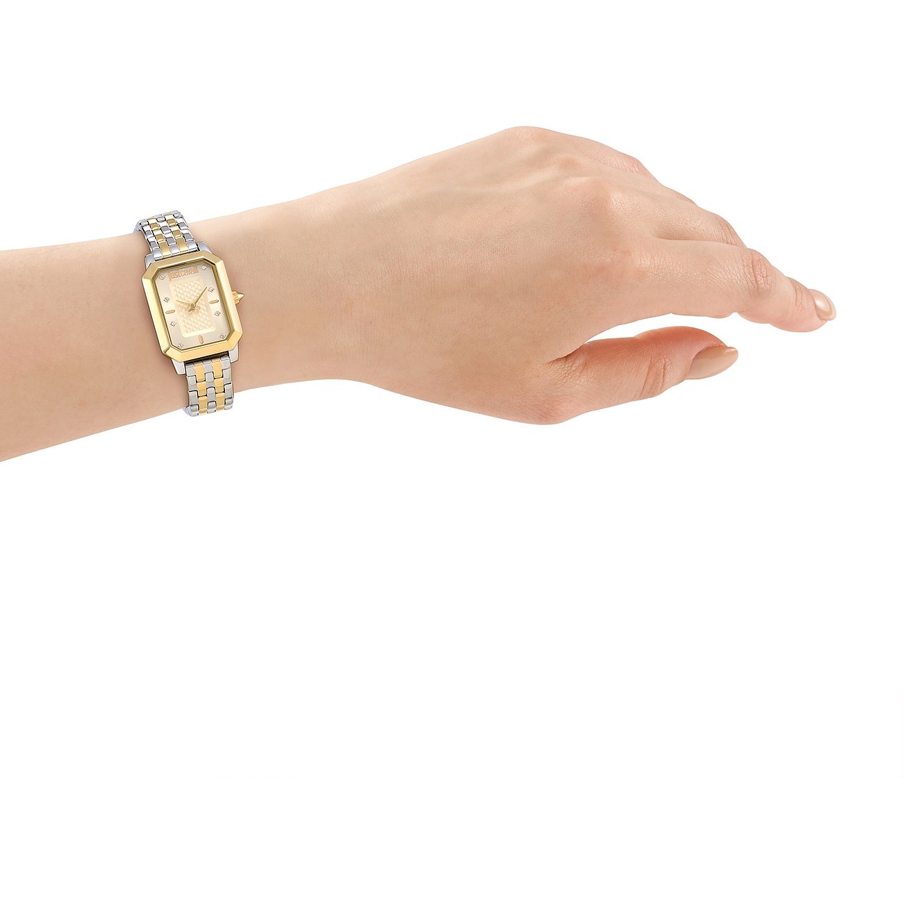 Am Handgelenk getragene Just Cavalli Damenuhr aus gold- und silberfarbenem Edelstahl mit rechteckigem Zifferblatt.