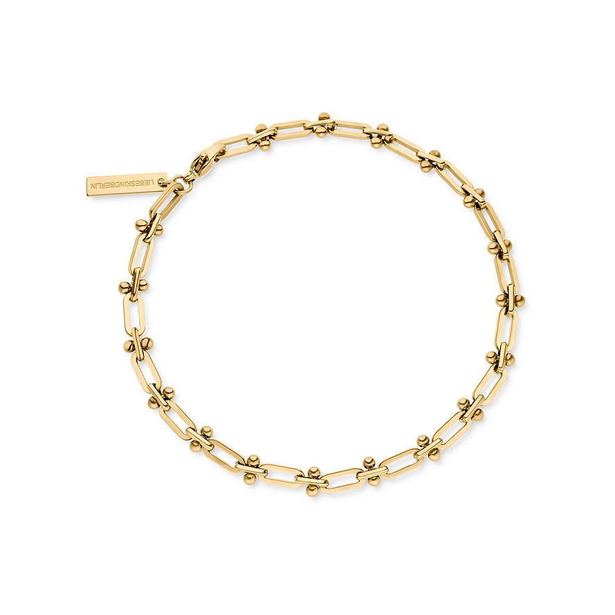 Et gyldent Liebeskind armbånd i rustfrit stål med filigranlænker og små kugler, set fra fugleperspektiv.