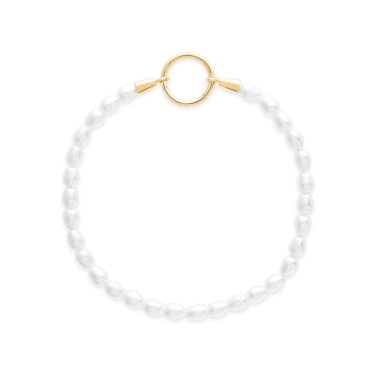 Ett Tamaris-armband med runda, krämfärgade pärlor och en gyllene låsring i rostfritt stål.