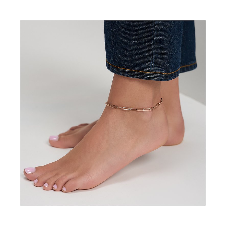 Una delicata cavigliera Tamaris in acciaio inossidabile color oro rosè. La catena a maglie avvolge elegantemente la caviglia.