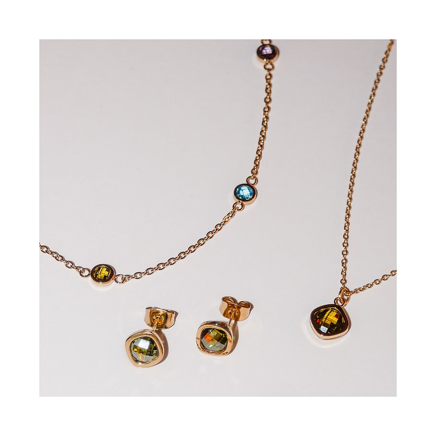 Set bestehend aus einer Tamaris Halskette und Ohrsteckern aus goldfarbenem Edelstahl mit Zirkonia-Farbsteinen.