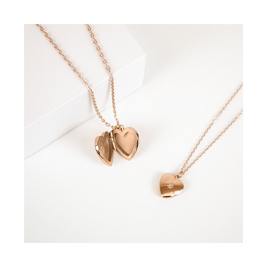 Médaillons cœur Tamaris en acier inoxydable couleur or rose. L'un ouvert, l'autre fermé avec un zirconium étincelant.