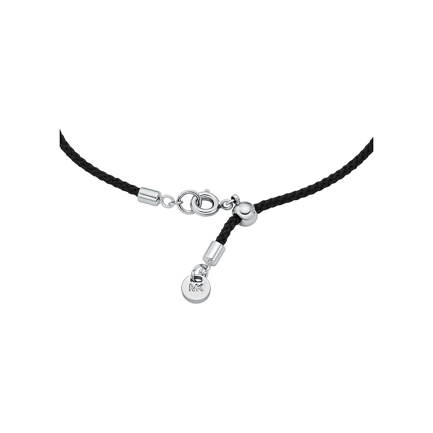 Ein Abschluss des Michael Kors Armschmucks aus Metall mit einem Zirkonia-Glanz, auf hellem Hintergrund.