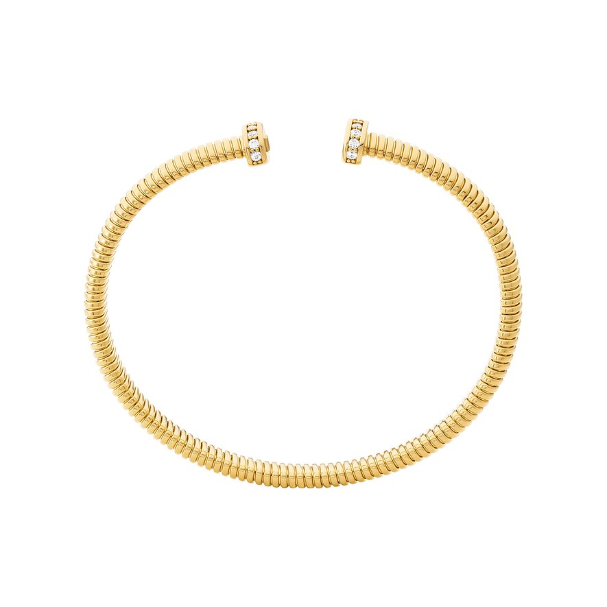 Michael Kors Armschmuck aus gelbgoldenem Metall mit offenem Design, die Enden sind mit Zirkonia-Steinen besetzt.