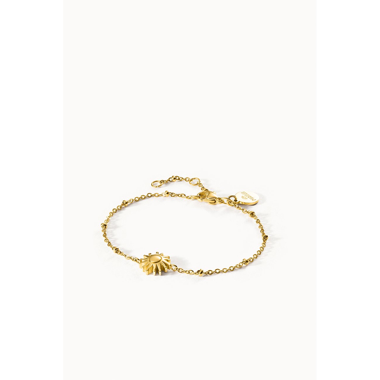Purelei Armband aus goldfarbenem Edelstahl mit einer Sonnenapplikation in der Mitte.