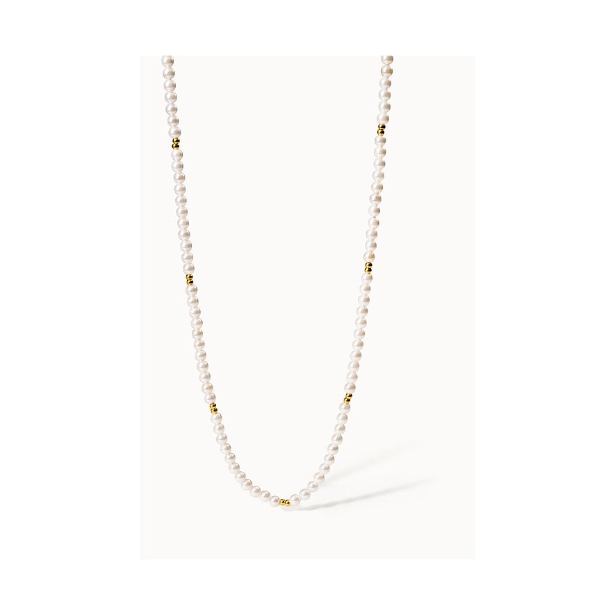 Eine lange Purelei Perlenkette aus Edelstahl mit kleinen goldenen Akzenten. Die Kette ist vertikal aufgereiht.