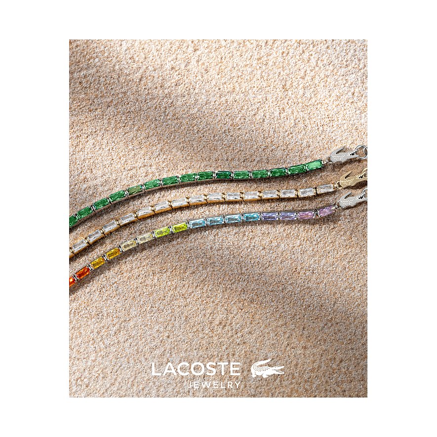 Drie Lacoste RVS armbanden met gekleurde zirkoniasteentjes in groen, wit en een kleurverloop.