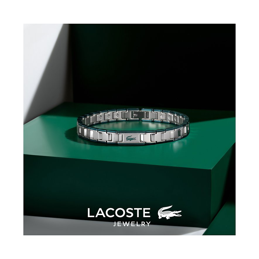 Lacoste roestvrijstalen armband met zilveren en donkerblauwe schakels en het krokodillenlogo