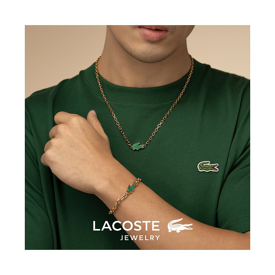 Lacoste Herren-Halskette & Armband: goldfarbener Edelstahl, Krokodilanhänger mit grünen Kristallen.